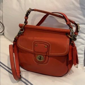 Crossbody coach bag orangey red